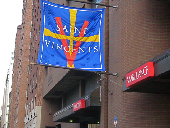 Saint Vincent's hospital entrance with flag.